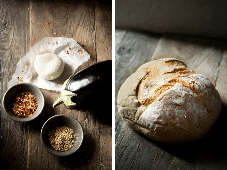Two photos one of eggplant, mozzarella, red pepper flakes and fennel seeds laid out on a wooden surface. The next is a loaf of crusty bread on a wooden surface. Eggplant Bruschetta, plus Mozzarella