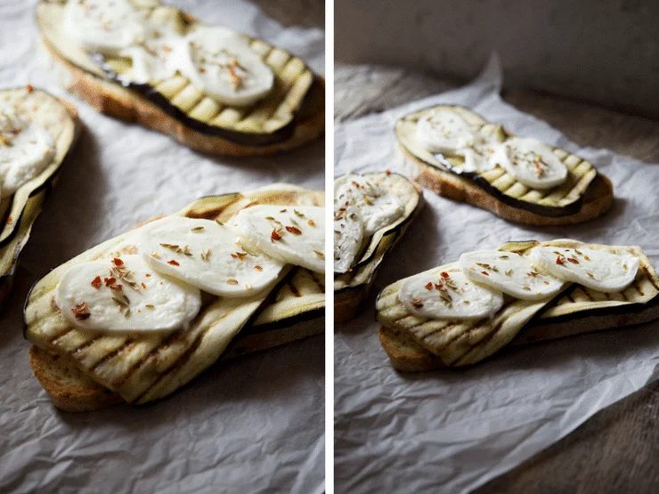 A close up photo of grilled eggplant on crusty bread with mozzarella. Eggplant Bruschetta, plus Mozzarella