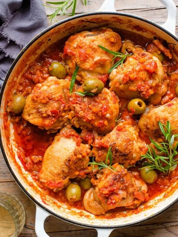 An overhead shot of chicken cacciatore in a skillet