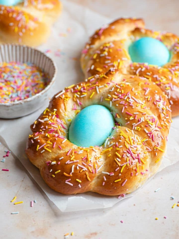 Italian Easter bread with a blue egg in the middle covered with sprinkles
