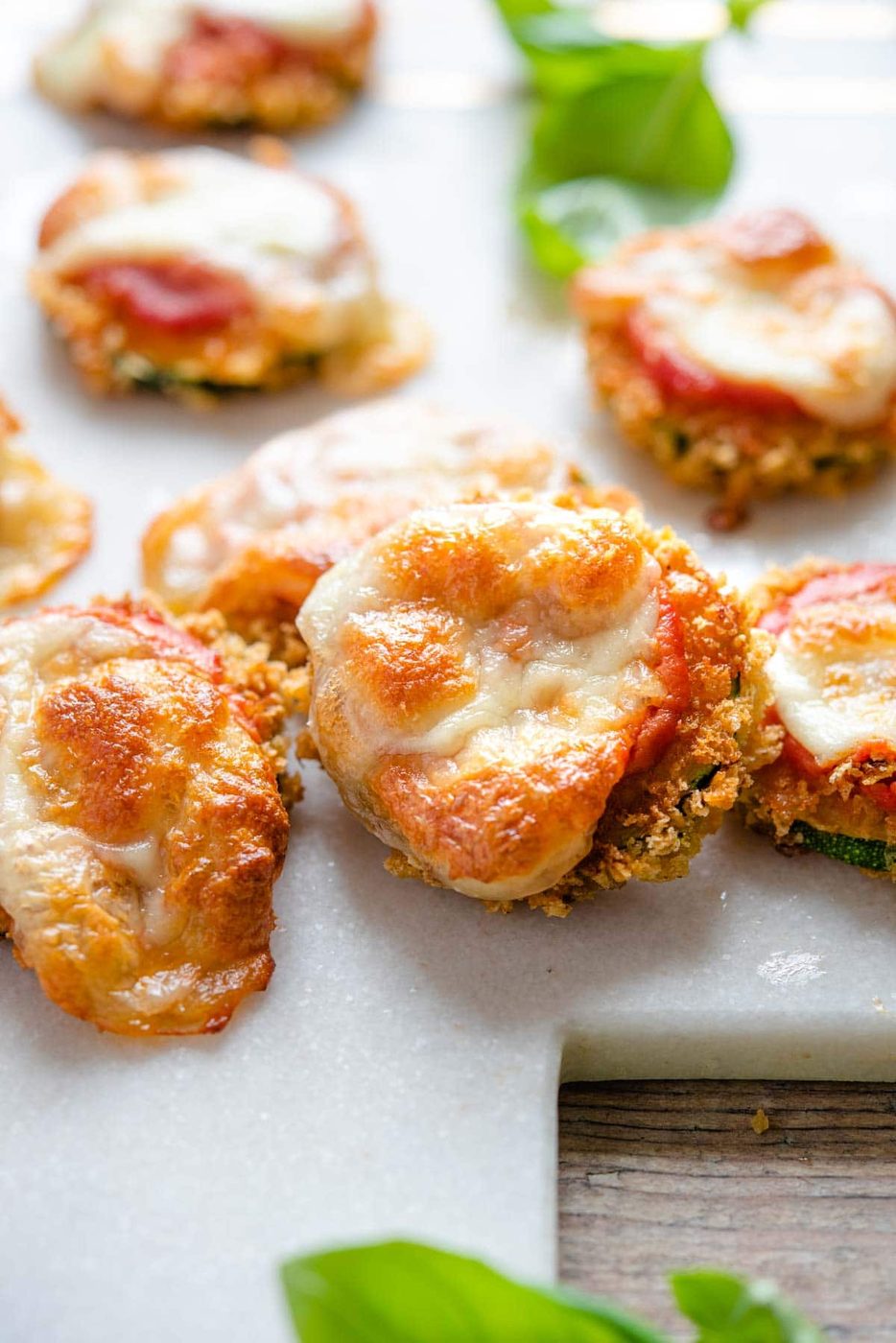 A close up of a zucchini pizza bite