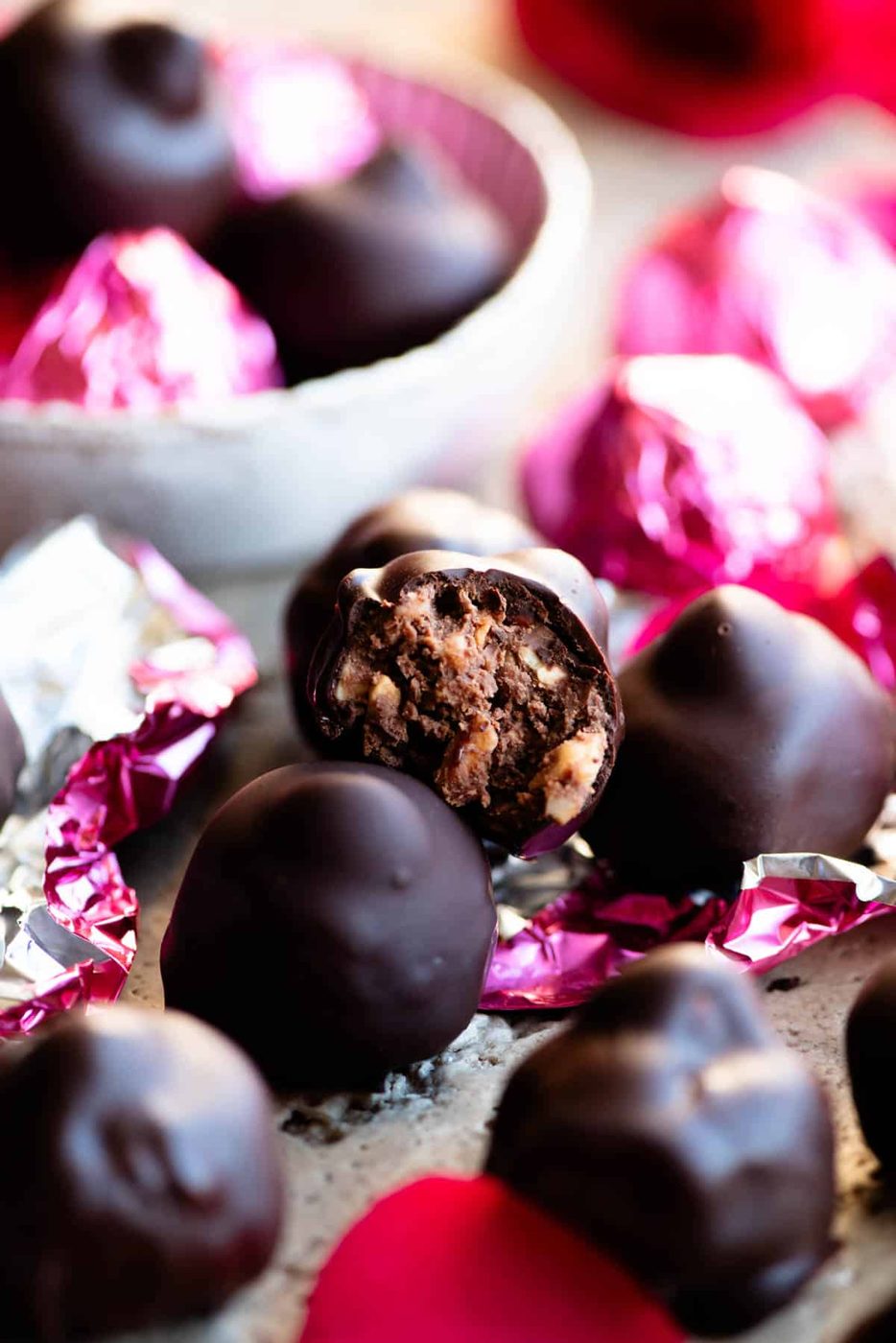 A close up of an Italian hazelnut chocolate bitten in half showing the inside.