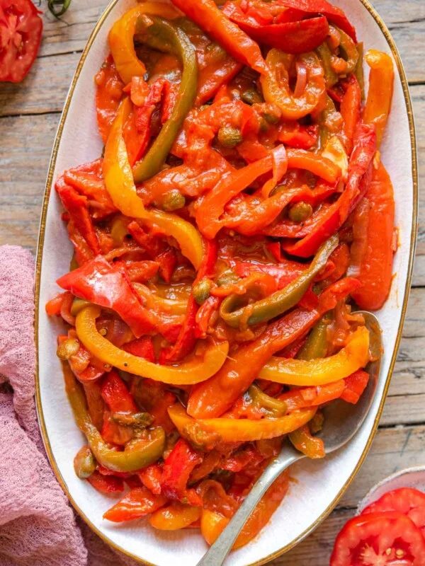 Peppers in tomato sauce on a serving plate
