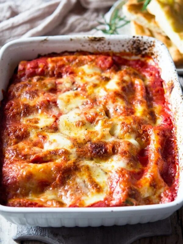 spinach and ricotta cannelloni in a large baking dish