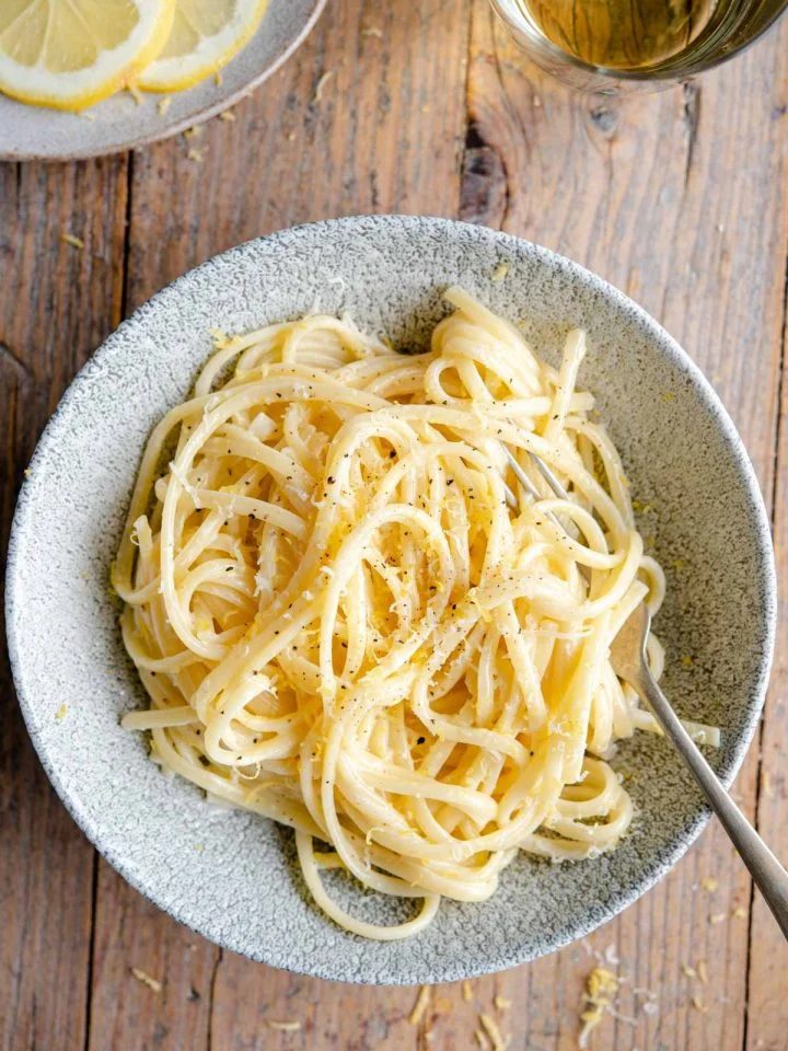 An overhead shot of pasta al limone in a bowl