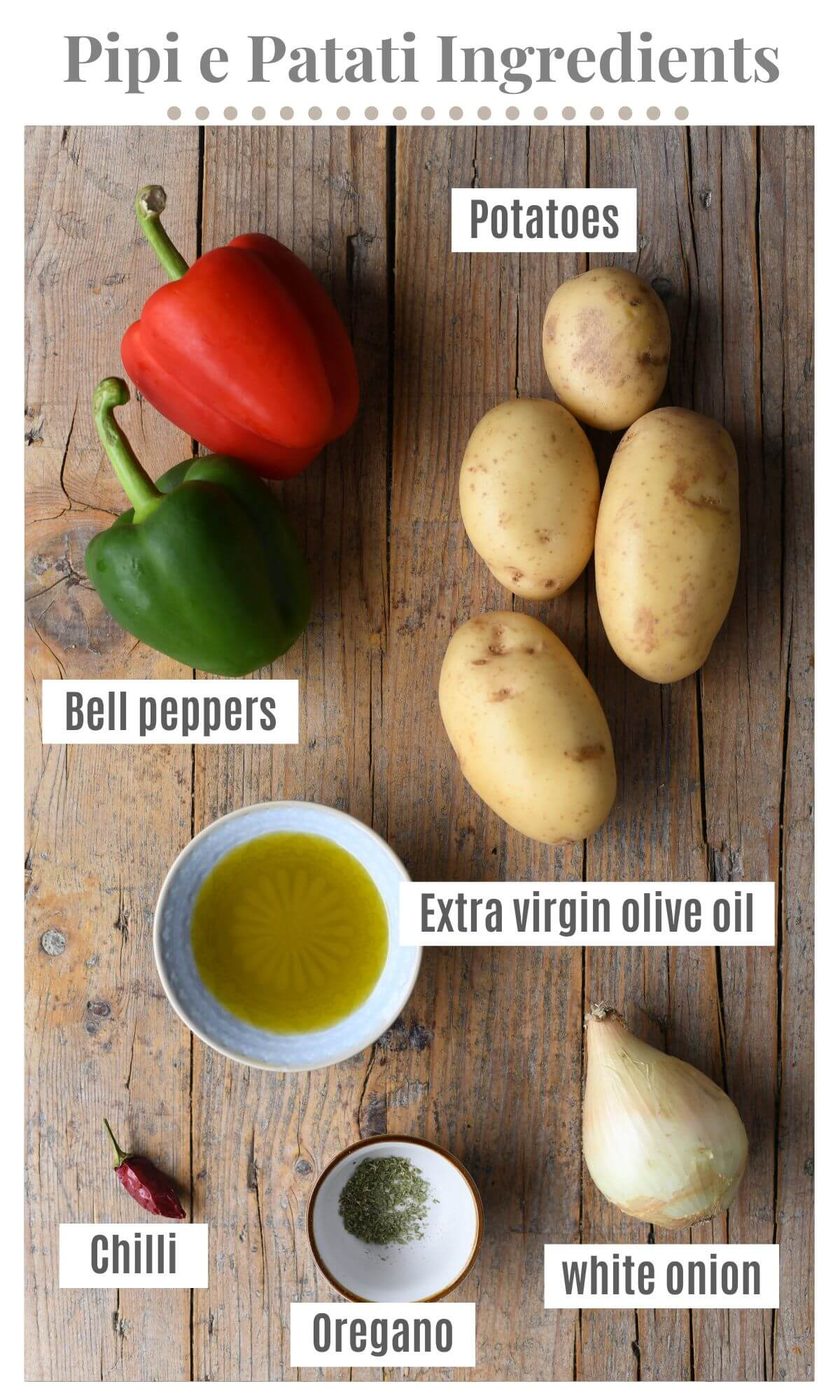 An overhead shot of all the ingredients needed to make Italian peppers and potatoes.