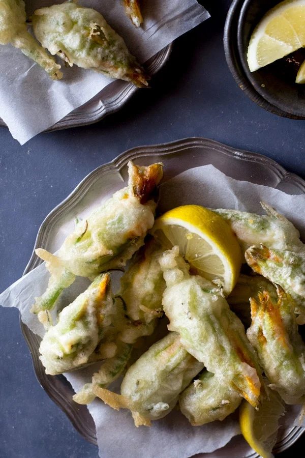 Crispy fried zucchini flowers stuffed with ricotta, chili flakes and lemon Vonfo