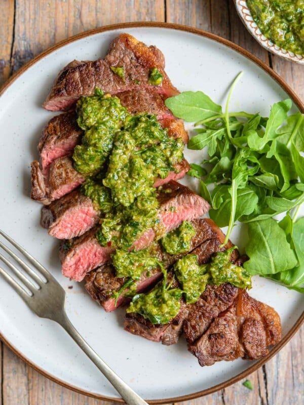 Salsa verde drizzled on top of steak
