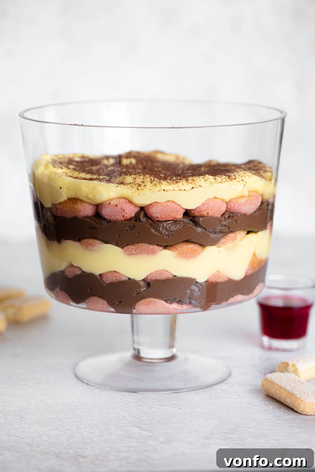 Italian Custard Trifle 2 Zuppa inglese (Italian trifle) in a glass trifle dish showcasing all the vibrant layers