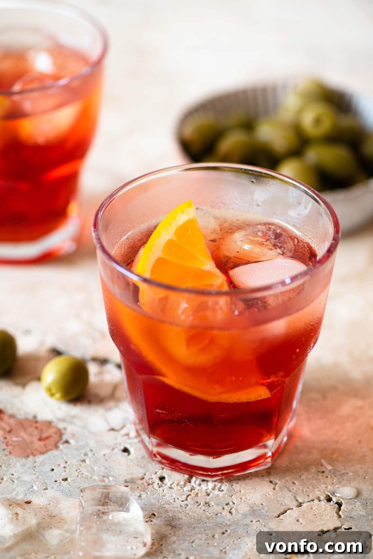 The Original Aperitivo 5 A close up of an Americano cocktail with a slice of orange