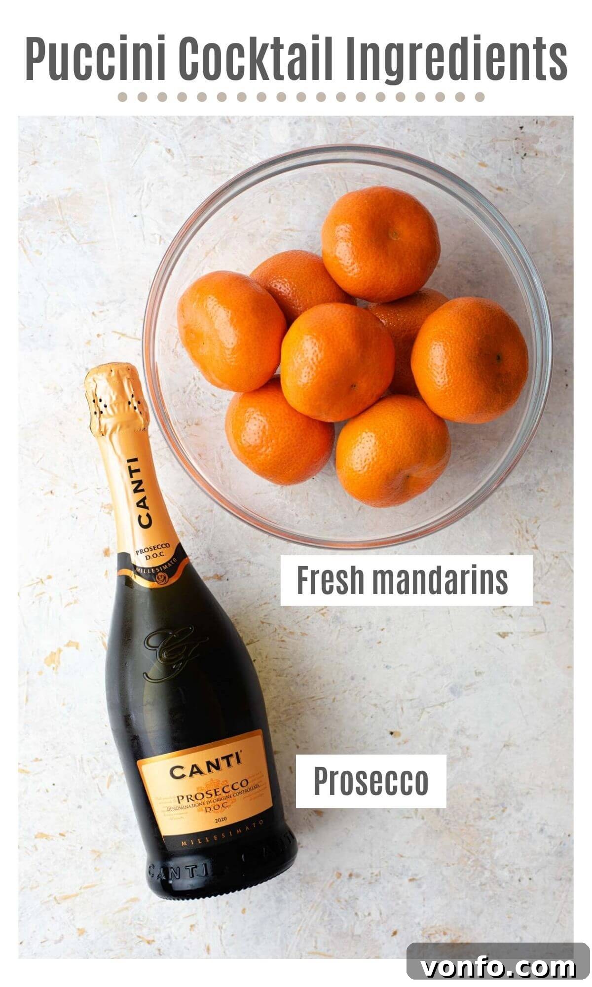 Mandarin Overture 3 An overhead shot showing fresh mandarins and a bottle of Prosecco, the two key ingredients for a Puccini cocktail.