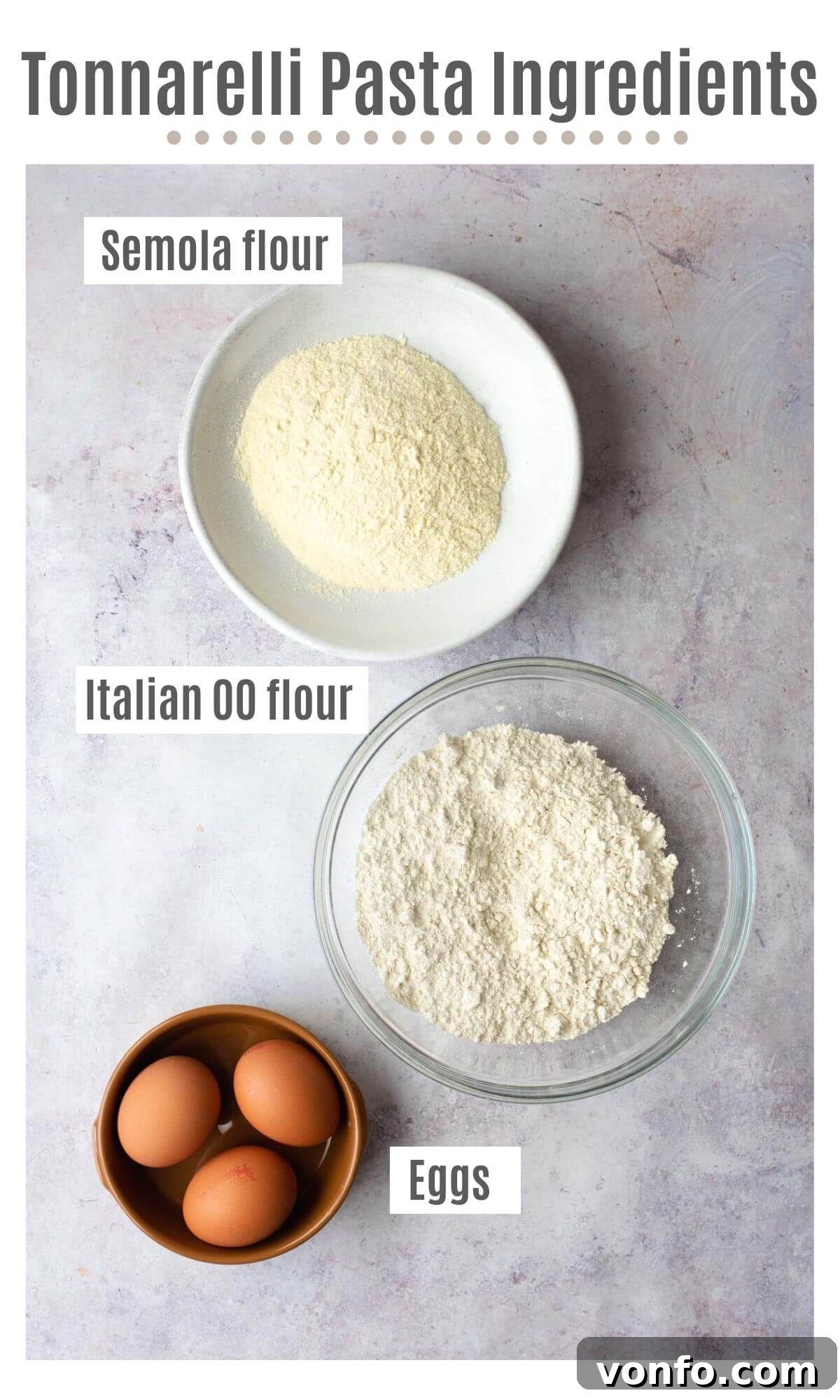 Fresh Tonnarelli: Handcrafted Chitarra Pasta 3 An overhead shot of all the ingredients needed to make tonnarelli pasta: Tipo 00 flour, semola, and eggs.