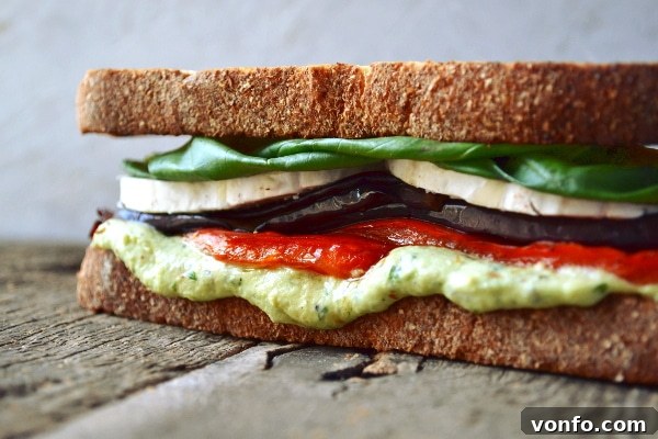 Close-up of a roasted vegetable and goat cheese sandwich