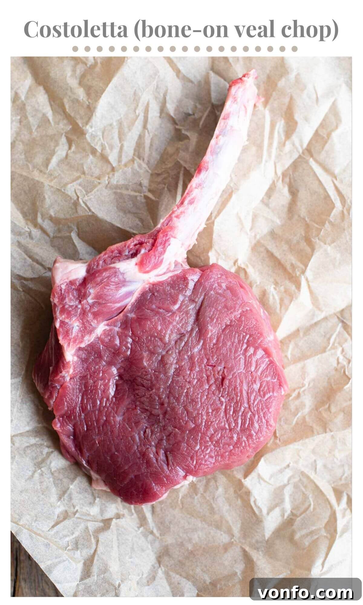 Golden Crispy Veal Stuffed with Fontina and Prosciutto 4 A close-up view of a raw, bone-in veal chop, showcasing its pristine quality and readiness for preparation. The bone is clearly visible, promising added flavor.