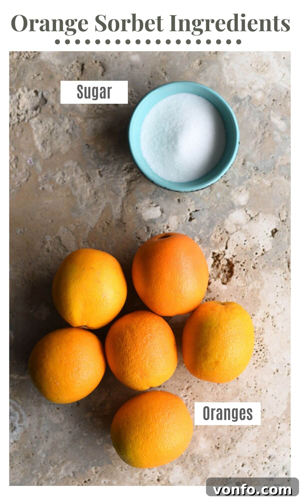 Effortless Orange Sorbet 3 An overhead shot of all the ingredients you need to make orange sorbet: fresh, ripe oranges and granulated sugar.