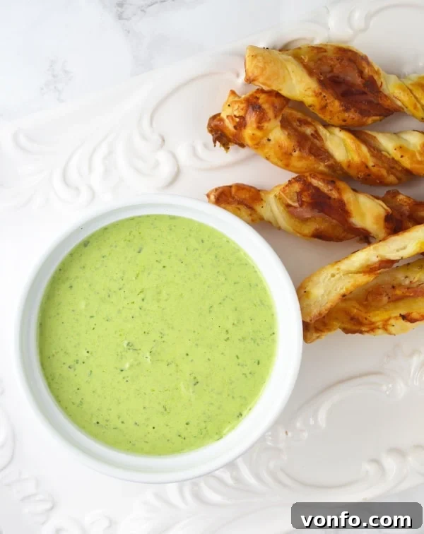 Delicious Sour Cream Pesto Dip with Crispy Prosciutto Dippers, perfect for parties