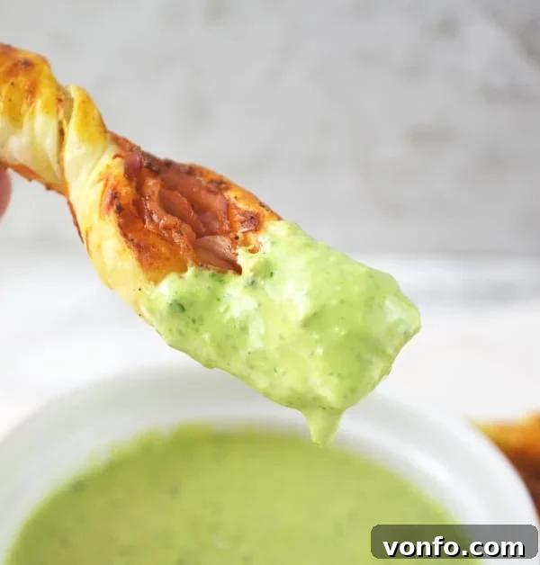 Creamy Sour Cream Pesto Dip served with crispy Prosciutto Dippers for easy party snacking