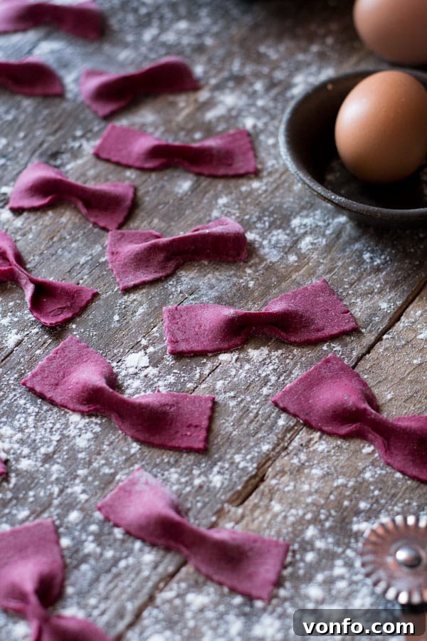 Mixing beetroot pasta dough ingredients