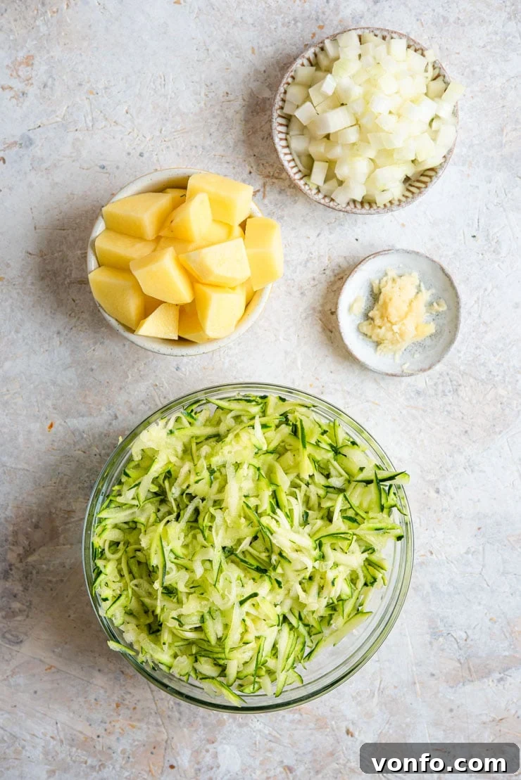 Creamy Italian Potato and Zucchini Soup - An easy soup that's comforting, warming and packed full of flavour. Healthy, delicious and easy comfort food the whole family will love. #zucchini #soup #comfortfood Ingredients prepped, cut and diced for making creamy zucchini soup