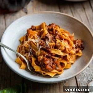 A square image of a rich Italian Beef Ragu dish.