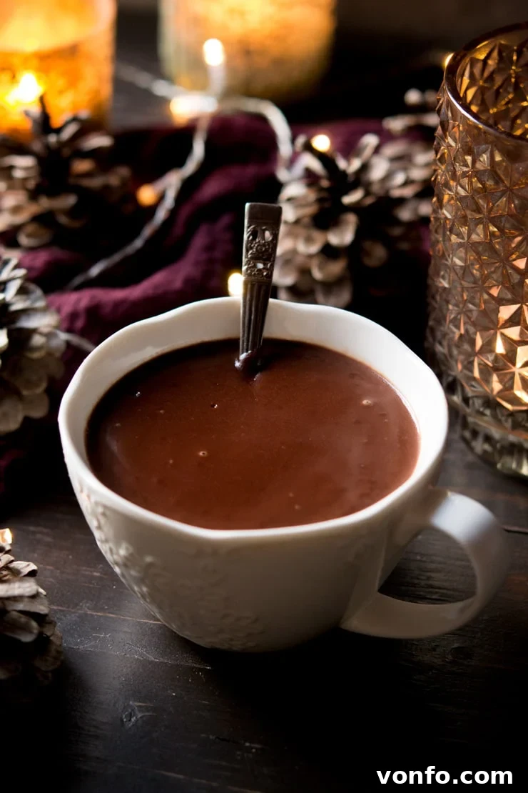 Authentic Italian Hot Chocolate Italian hot chocolate in a white mug with a spoon