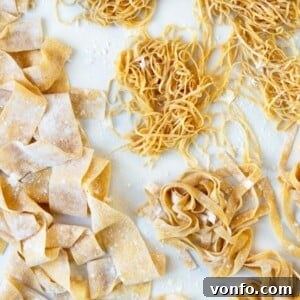 A tightly rolled ball of fresh homemade pasta dough, showcasing its smooth texture and vibrant yellow color, ready for kneading or resting, symbolizing high-quality ingredients and traditional preparation.