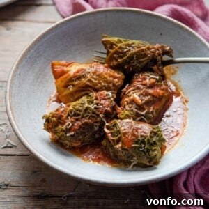 Tuscan Stuffed Cabbage Rolls 2 Italian Stuffed Cabbage Rolls in a baking dish before serving.