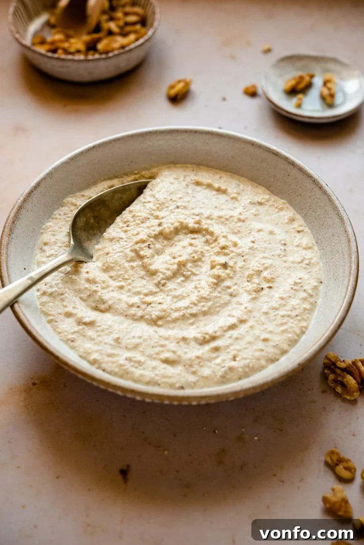 Versatile Salsa di Noci in a Rustic Bowl Creamy Italian walnut sauce, Salsa di Noci, served beautifully in a rustic ceramic bowl