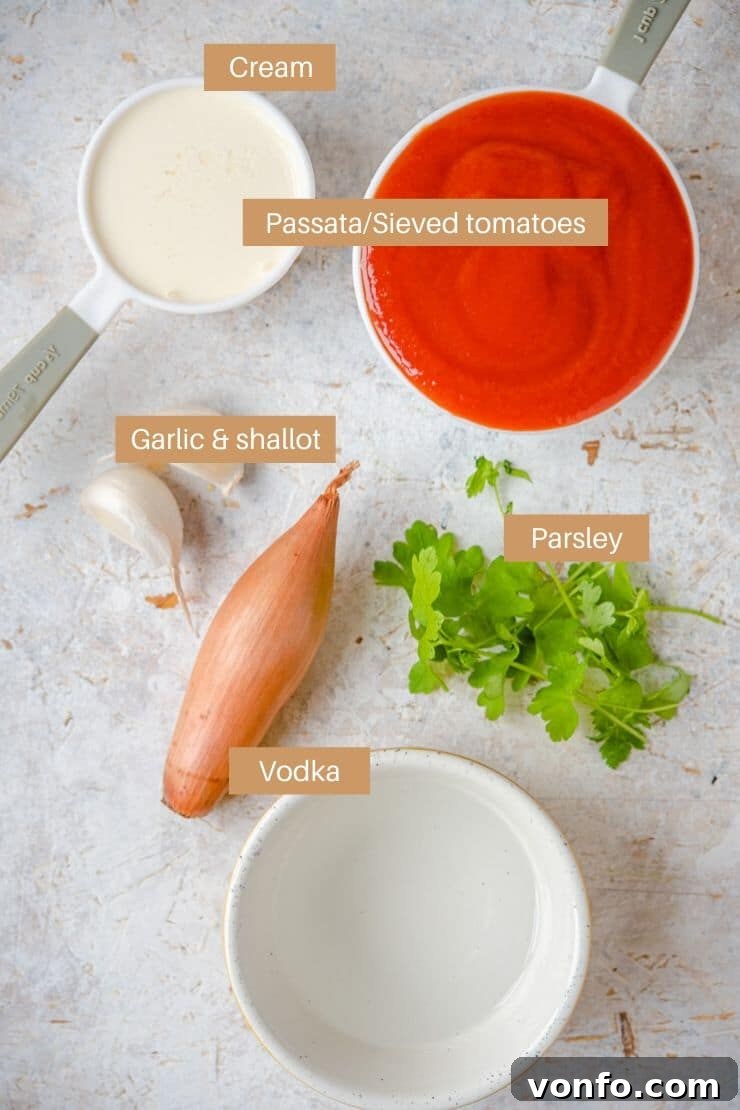 Ingredients for Creamy Tomato Vodka Sauce A photo showcasing all the fresh ingredients needed to prepare the creamy tomato vodka sauce, including sieved tomatoes, cream, shallots, garlic, and vodka.