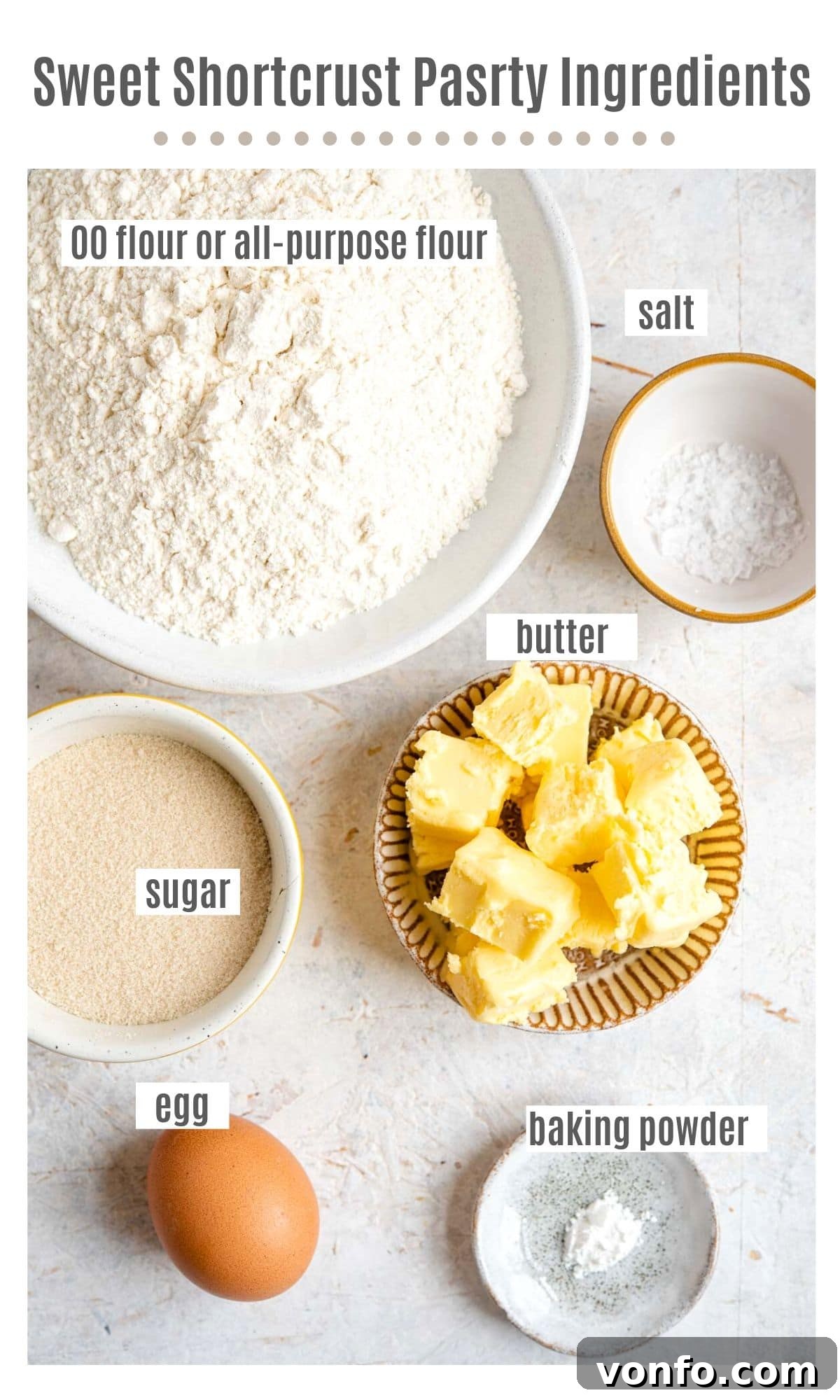 Traditional Italian Sweet Shortcrust Pasta Frolla 3 An overhead shot of all the ingredients needed to make sweet shortcrust pastry, neatly arranged on a kitchen counter.
