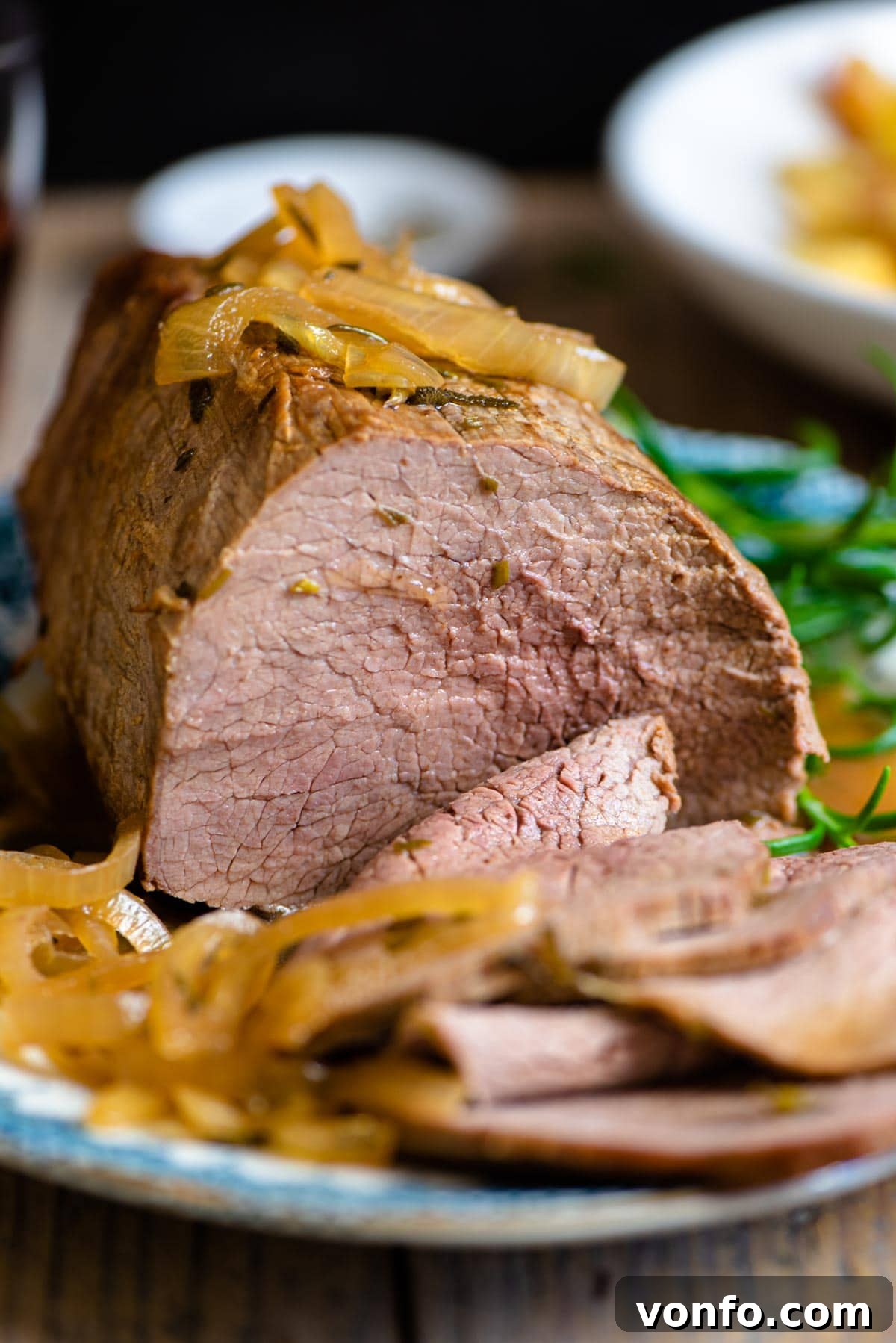 Tender Italian Roast Beef with Marsala and Caramelized Onions 6 Close-up of Italian roast beef with caramelized onions and gravy