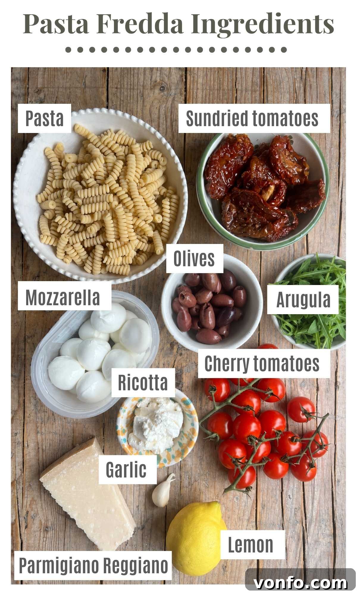 Sun-Dried Tomato Pasta Fredda: Chilled Mediterranean Pasta Salad 3 An overhead shot of all the ingredients needed to make a sundried tomato pasta salad.