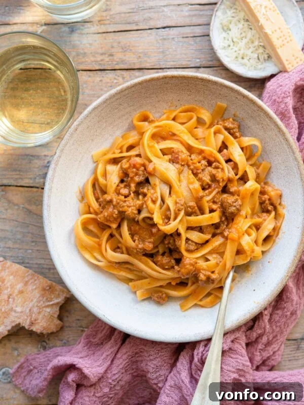 Slow-Braised Eggplant and Sausage Ragu 6 An overhead shot of tagliatelle bolognese in a rustic bowl