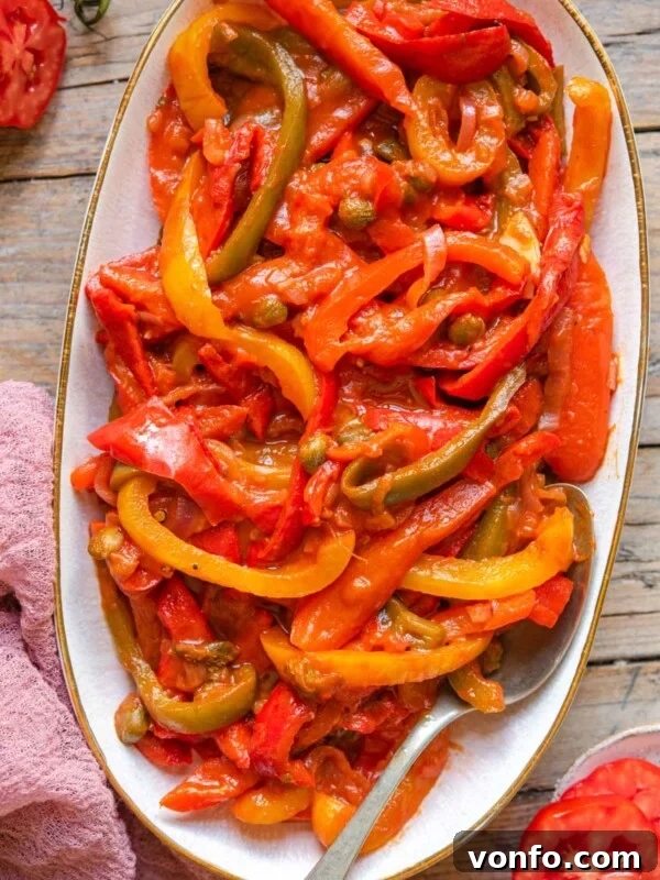 Peppers in tomato sauce on a serving plate