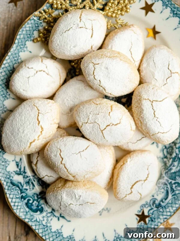 An overhead shot of Ricciarelli almond cookies on a plate
