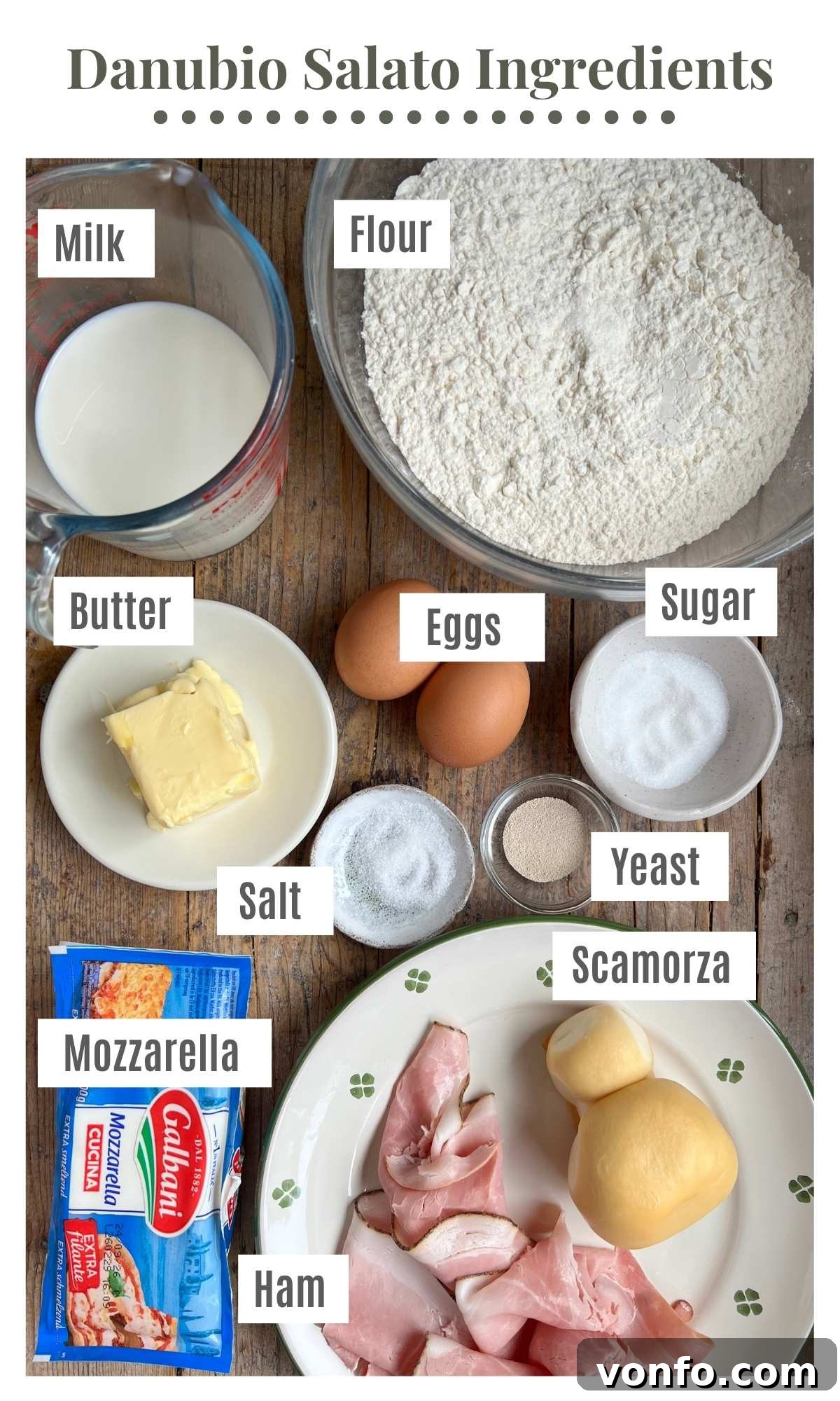 Danubio Salato: Neapolitan Savory Stuffed Brioche Buns 3 An overhead shot of all the ingredients needed to make danubio salato on a rustic wooden surface.